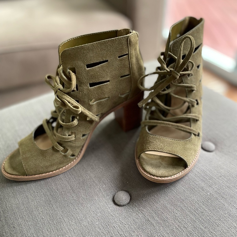 Vince Camuto Tressa perforated lace up bootie.